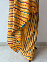 Load image into Gallery viewer, Lambani Embroidered Tussar Leheriya Saree